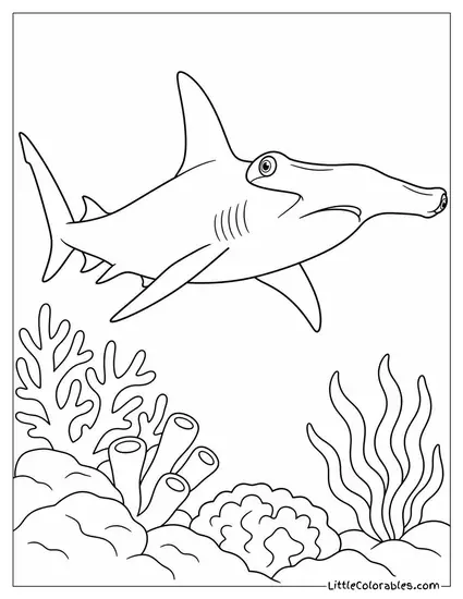 Hammerhead Shark Cruising Along a Coral Reef Coloring Page