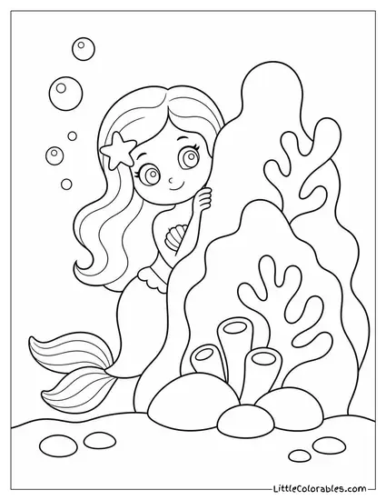 Cartoon Mermaid Playing Hide and Seek Behind a Coral Reef Coloring Page